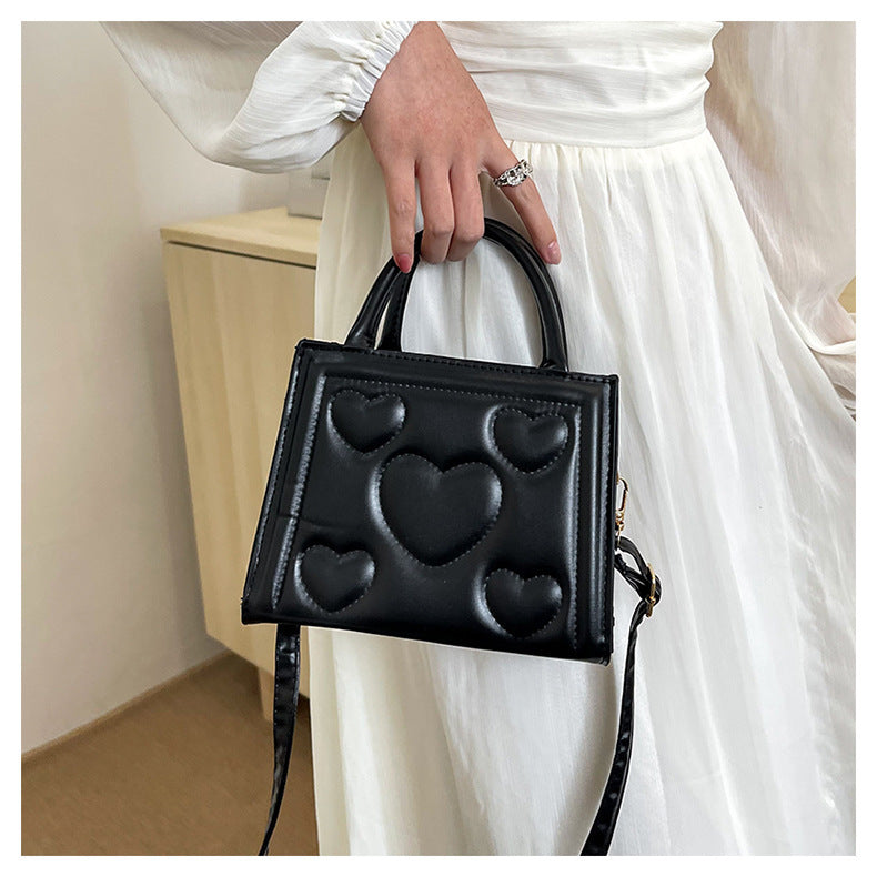 1pc Women’s Stylish Solid Color Handbag with Detachable Strap – Heart Pattern Design, Perfect for Valentine’s Day Gift, Available in Magenta, White, Black, Green, Yellow
